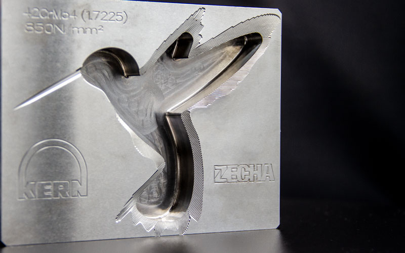 Hardened-steel logo engraved with a 0.3 mm Kingfisher tool